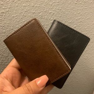 Leather RFID blocking lever wallet. Brown or Black available.